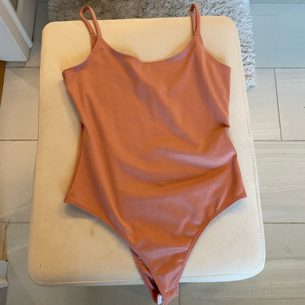 Mauve body suit